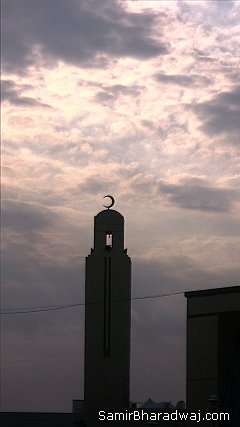 Mosque minaret against the clouds - Widescreen photo