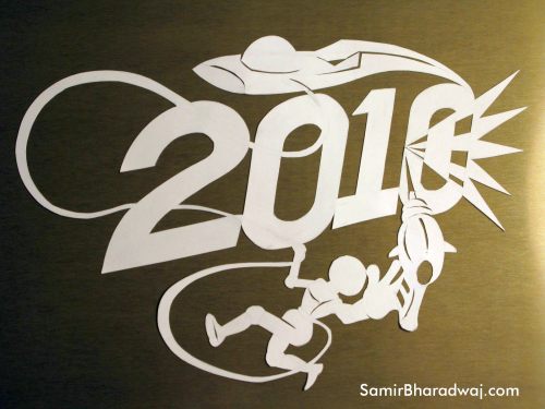 2010 paper cutting on a shiny board
