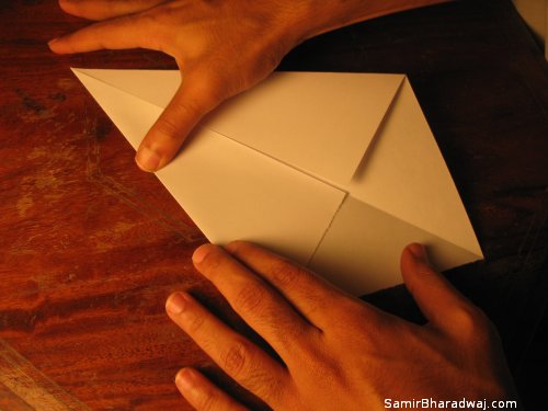 Creasing and folding an origami Diwali lamp - step 04