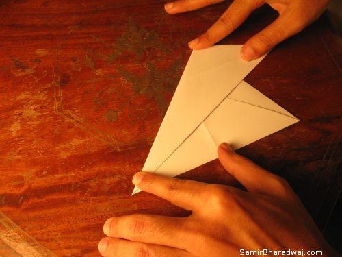 Creasing and folding an origami Diwali lamp - step 06