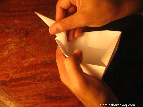 Creasing and folding an origami Diwali lamp - step 26